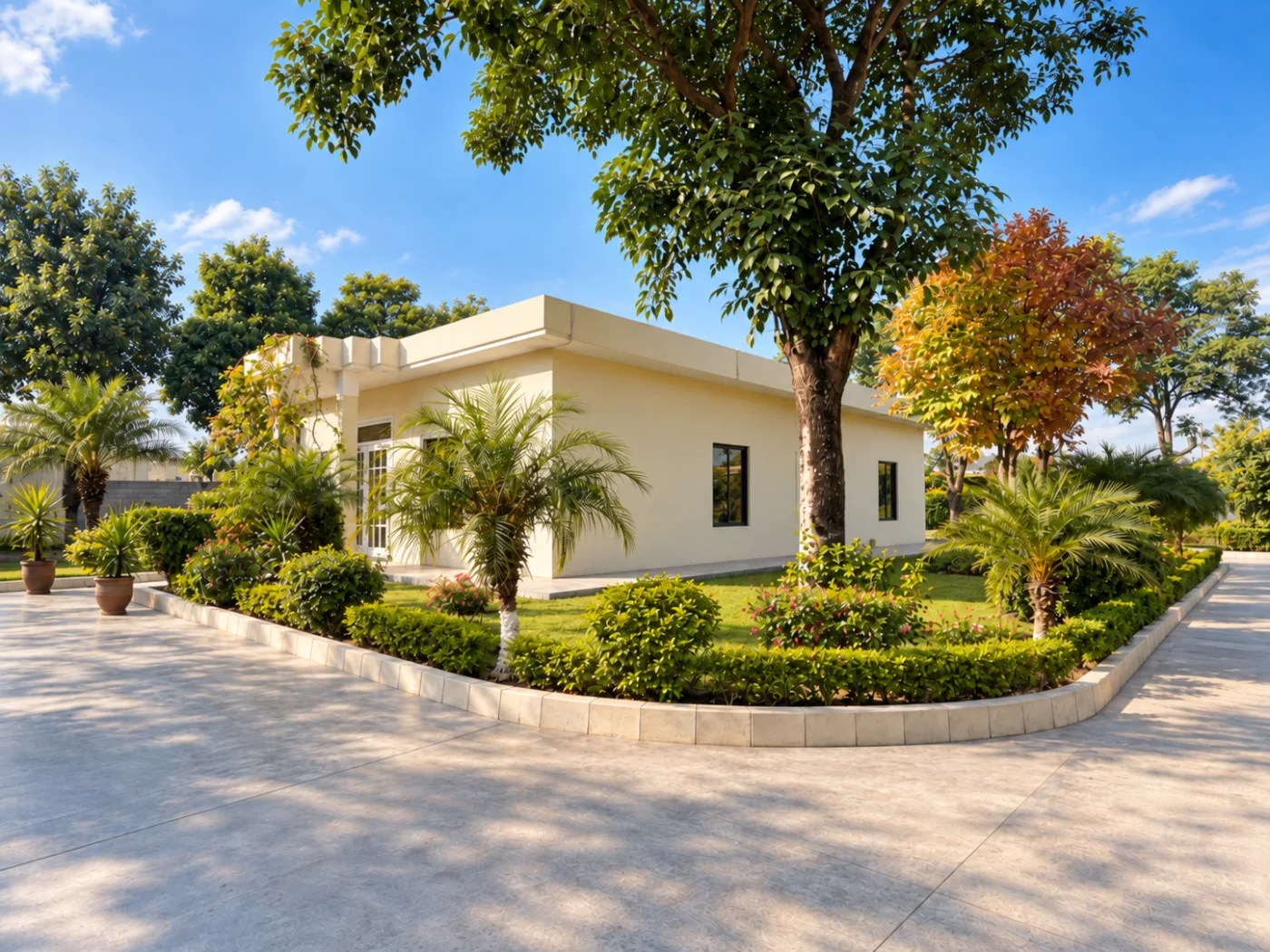 The planted courtyard and paved forecourt at the GIHD Mandra campus