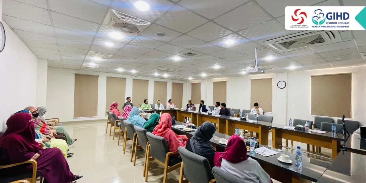 Faculty and hospital leadership seated at the MoU signing ceremony