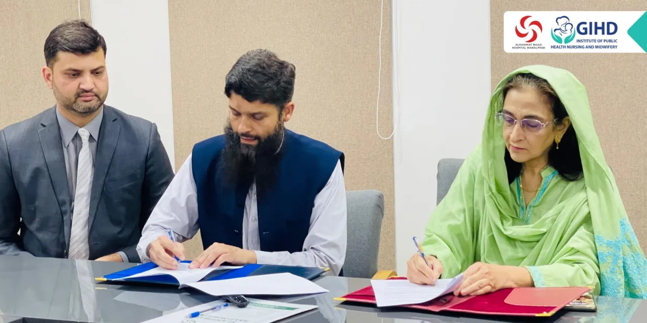 GIHD and hospital leadership at the signing table